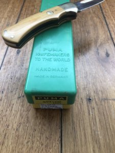 Puma Knife: Puma Original 1986 4 Star Folding Lock Blade Knife with Orange Ivory Micarta Handle in Original Box