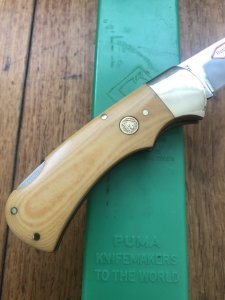 Puma Knife: Puma Original 1986 4 Star Folding Lock Blade Knife with Orange Ivory Micarta Handle in Original Box