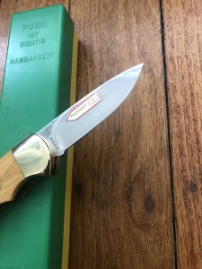 Puma Knife: Puma Original 1986 4 Star Folding Lock Blade Knife with Orange Ivory Micarta Handle in Original Box
