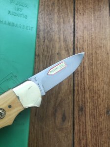 Puma Knife: Puma Original 1986 4 Star Folding Lock Blade Knife with Orange Ivory Micarta Handle in Original Box