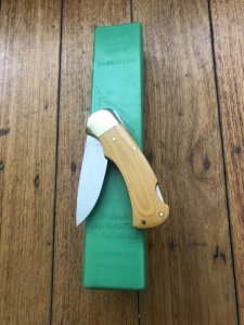 Puma Knife: Puma Original 1986 4 Star Folding Lock Blade Knife with Orange Ivory Micarta Handle in Original Box