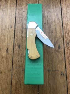 Puma Knife: Puma Original 1986 4 Star Folding Lock Blade Knife with Orange Ivory Micarta Handle in Original Box