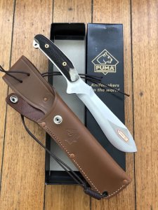Puma Knife: Puma Rare Original 2001 Dark Stag New Hunter Model 118375 in original sheath and box.