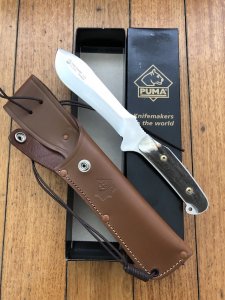 Puma Knife: Puma Rare Original 2001 Dark Stag New Hunter Model 118375 in original sheath and box.