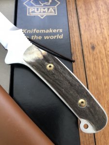 Puma Knife: Puma Rare Original 2001 Dark Stag New Hunter Model 118375 in original sheath and box.