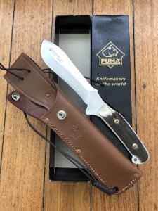Puma Knife: Puma Rare Original 2001 Dark Stag New Hunter Model 118375 in original sheath and box.