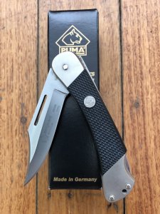 Puma Knife: PUMA 2012 Sergeant Folding Lock Knife With Black Handle.