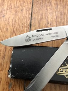 Puma Knife: Puma Trapper Lockback Knife with Red Smooth Bone Handle