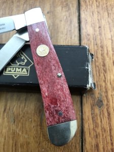 Puma Knife: Puma Trapper Lockback Knife with Red Smooth Bone Handle