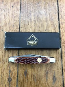 Puma Knife: Puma Bantam Folding Knife with Red Bone Handle Circa early 2000