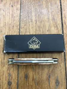 Puma Knife: Puma Bantam Folding Knife with Red Bone Handle Circa early 2000