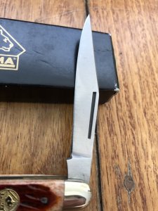 Puma Knife: Puma Bantam Folding Knife with Red Bone Handle Circa early 2000