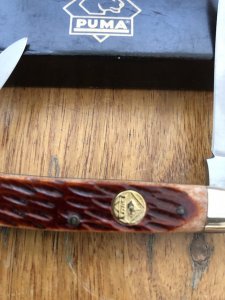 Puma Knife: Puma Bantam Folding Knife with Red Bone Handle Circa early 2000