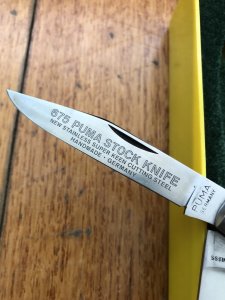 Puma Knife: Puma Rare Original 1977 Boxed 675 Stock Knife with Red Bone Handle