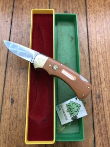 Puma Knife: Puma Original 1980 4 Star Folding Lock Blade Knife with Dark Orange Ivory Micarta Handle in Original Box & Warranty