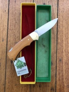 Puma Knife: Puma Original 1980 4 Star Folding Lock Blade Knife with Dark Orange Ivory Micarta Handle in Original Box & Warranty