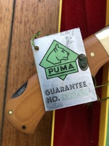 Puma Knife: Puma Original 1980 4 Star Folding Lock Blade Knife with Dark Orange Ivory Micarta Handle in Original Box & Warranty