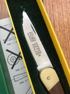 Puma Knife: Puma 1989 model 765 Setter Folding Knife with Jacaranda Handle Original Box and matching Warranty