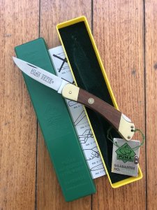 Puma Knife: Puma 1989 model 765 Setter Folding Knife with Jacaranda Handle Original Box and matching Warranty