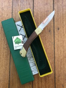 Puma Knife: Puma 1989 model 765 Setter Folding Knife with Jacaranda Handle Original Box and matching Warranty