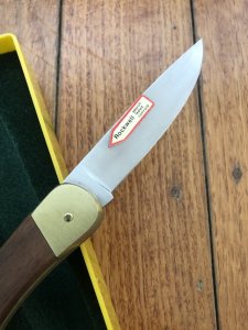 Puma Knife: Puma 1989 model 765 Setter Folding Knife with Jacaranda Handle Original Box and matching Warranty