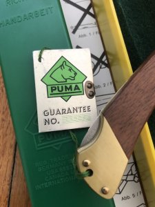 Puma Knife: Puma 1989 model 765 Setter Folding Knife with Jacaranda Handle Original Box and matching Warranty