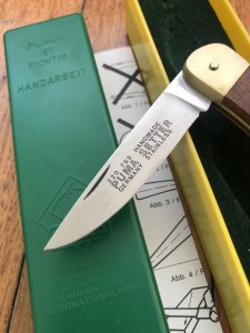 Puma Knife: Puma 1989 model 765 Setter Folding Knife with Jacaranda Handle Original Box and matching Warranty