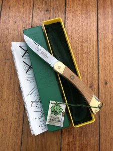 Puma Knife: Puma 1987 model 770 Pointer Folding Knife with Jacaranda Handle Original Box and matching Warranty