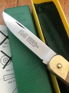 Puma Knife: Puma 1987 model 770 Pointer Folding Knife with Jacaranda Handle Original Box and matching Warranty