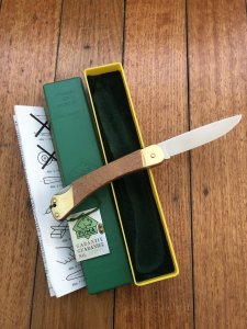 Puma Knife: Puma 1987 model 770 Pointer Folding Knife with Jacaranda Handle Original Box and matching Warranty