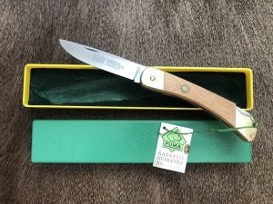 Puma Knife: Puma 1987 model 770 Pointer Folding Knife with Jacaranda Handle Original Box and matching Warranty