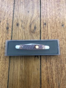 Puma Knife: Puma Bantam Folding Knife with Red Bone Handle Circa early 1990's