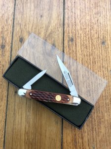 Puma Knife: Puma Bantam Folding Knife with Red Bone Handle Circa early 1990's