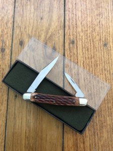 Puma Knife: Puma Bantam Folding Knife with Red Bone Handle Circa early 1990's