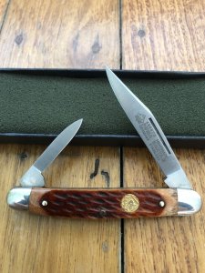 Puma Knife: Puma Bantam Folding Knife with Red Bone Handle Circa early 1990's