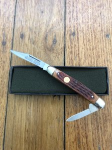 Puma Knife: Puma Bantam Folding Knife with Red Bone Handle Circa early 1990's