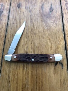 Puma Knife: Puma Bantam Folding Knife with Red Bone Handle Circa early 1990's