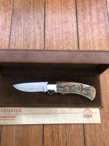 Puma Knife: Puma Original Scrimshawed Puma Mountain Lion 4 Star Folding Lock Blade Knife with Presentation Box