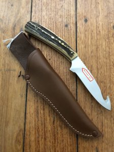 Puma Knife: Puma Pro Hunter Gut Hook Knife with Stag Handle & Light Brown Sheath