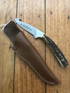 Puma Knife: Puma Pro Hunter Gut Hook Knife with Stag Handle & Light Brown Sheath