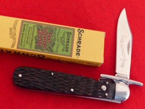 Schrade SCCS2010 Cutlery Collectors Society swing guard button lock folding knife.