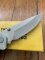 Buck Knife: 2006 Model Buck Alpha Hunter Folding Knife with Black Rubberised Handle & Pouch
