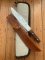 Puma Knife: 1987 Puma Big Big Bowie knife with Wooden Handle in original Tan Leather Sheath & Case