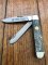 Puma Knife: Puma Trapper Lockback Knife with Green Smooth Bone Handle