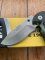 Buck Knife: 2007 Model 395 Medium Buck OMNI Hunter Folding Knife with Camo Handle & Pouch