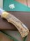 Puma Knife: Puma 1983 Original 4 Star Folding Lock Blade Scrimshawed Roaring Red Stag Knife with in Presentation Box #71/300