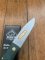 Puma Knife: Puma IP Special Edition 'RIFLEMAN' Green Micarta Folding Lock Knife