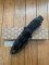 LionSTEEL Italy. Model T5 MI Canvas Micarta Handle Black Blade with Leather Sheath