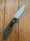 Ontario Knife Company ON8874TC Plain Brushed Silver Edge Folding Knife with Olive Drab Handle