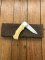 Puma Knife: Puma 1987 Original Scrimshawed 4 Star Folding Lock Blade Knife with Cape buffalo in Presentation Box